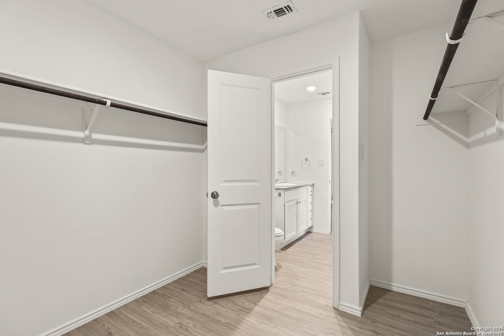 6430 Level Flight Converse, TX 78109 - Photo 12 of 19 a view of a hallway with wooden floor