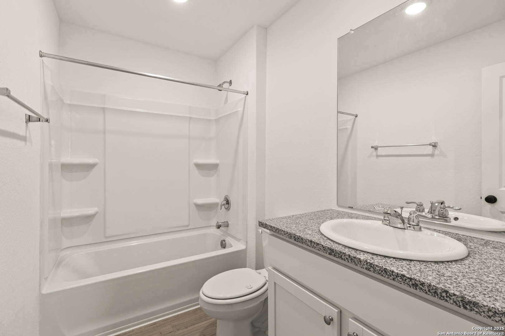 6430 Level Flight Converse, TX 78109 - Photo 15 of 19 a bathroom with a granite countertop sink a toilet and shower