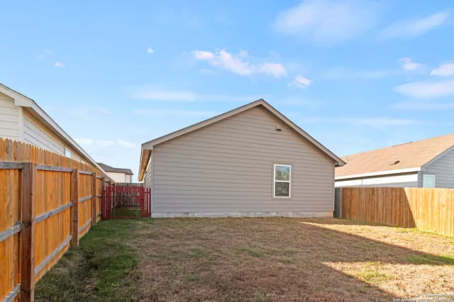 a view of backyard of house