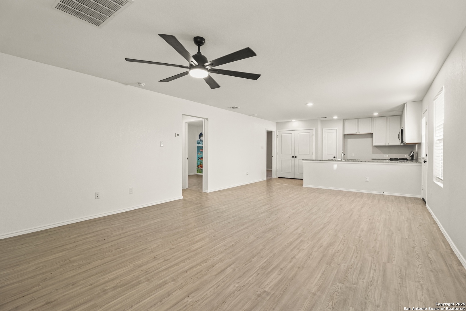 6430 Level Flight Converse, TX 78109 - Photo 4 of 19 a view of a kitchen with a sink and wooden floor