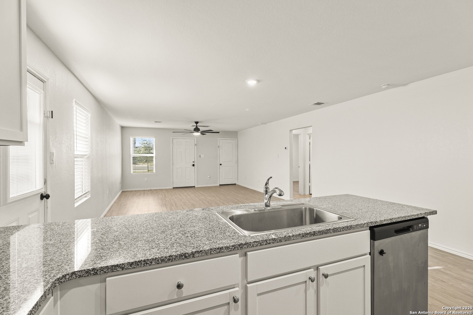 6430 Level Flight Converse, TX 78109 - Photo 7 of 19 a kitchen with a sink and cabinets