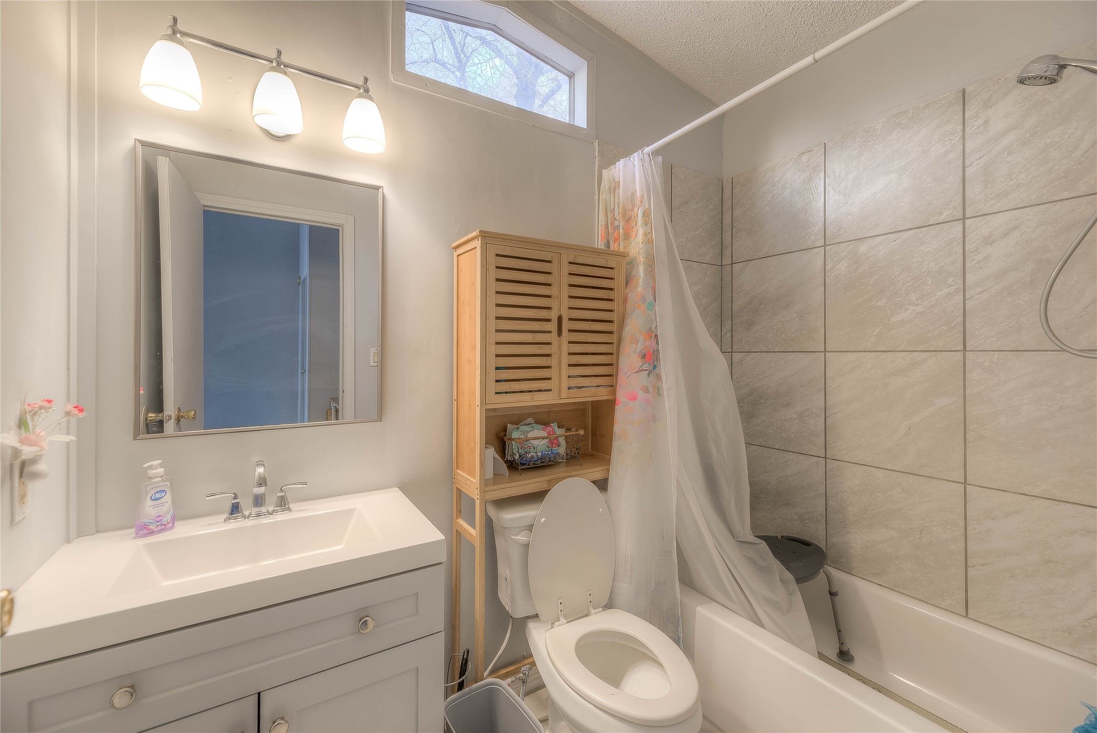 17709 Pine View Drive Conroe, TX 77302 - Photo 17 of 26 a bathroom with a sink a toilet and shower