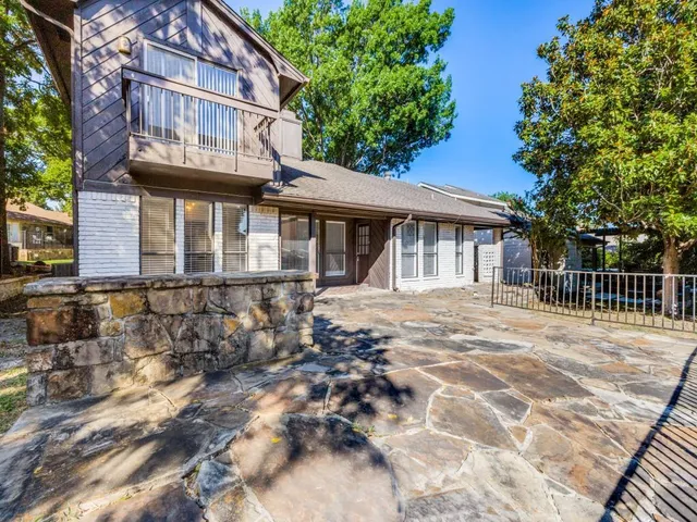 a view of a house with a patio