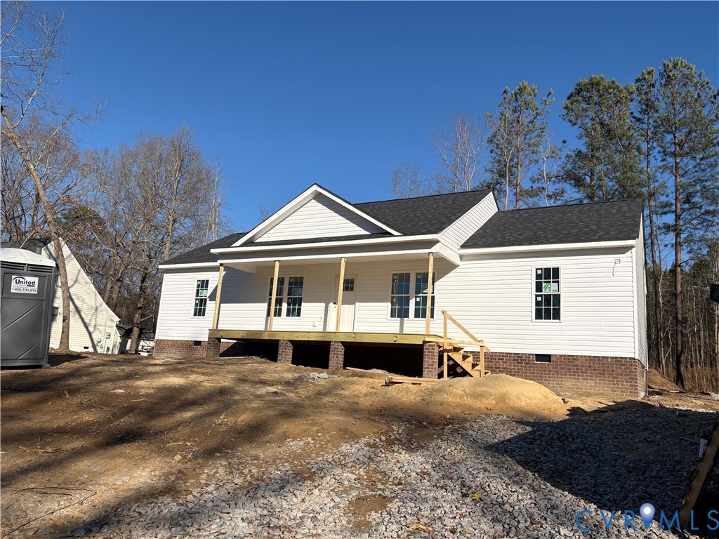 6904 Hearthside Drive Prince George, VA 23875 - Photo 1 of 19 a front view of a house with a yard