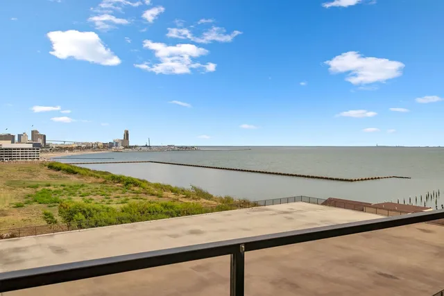a view of swimming pool from a balcony