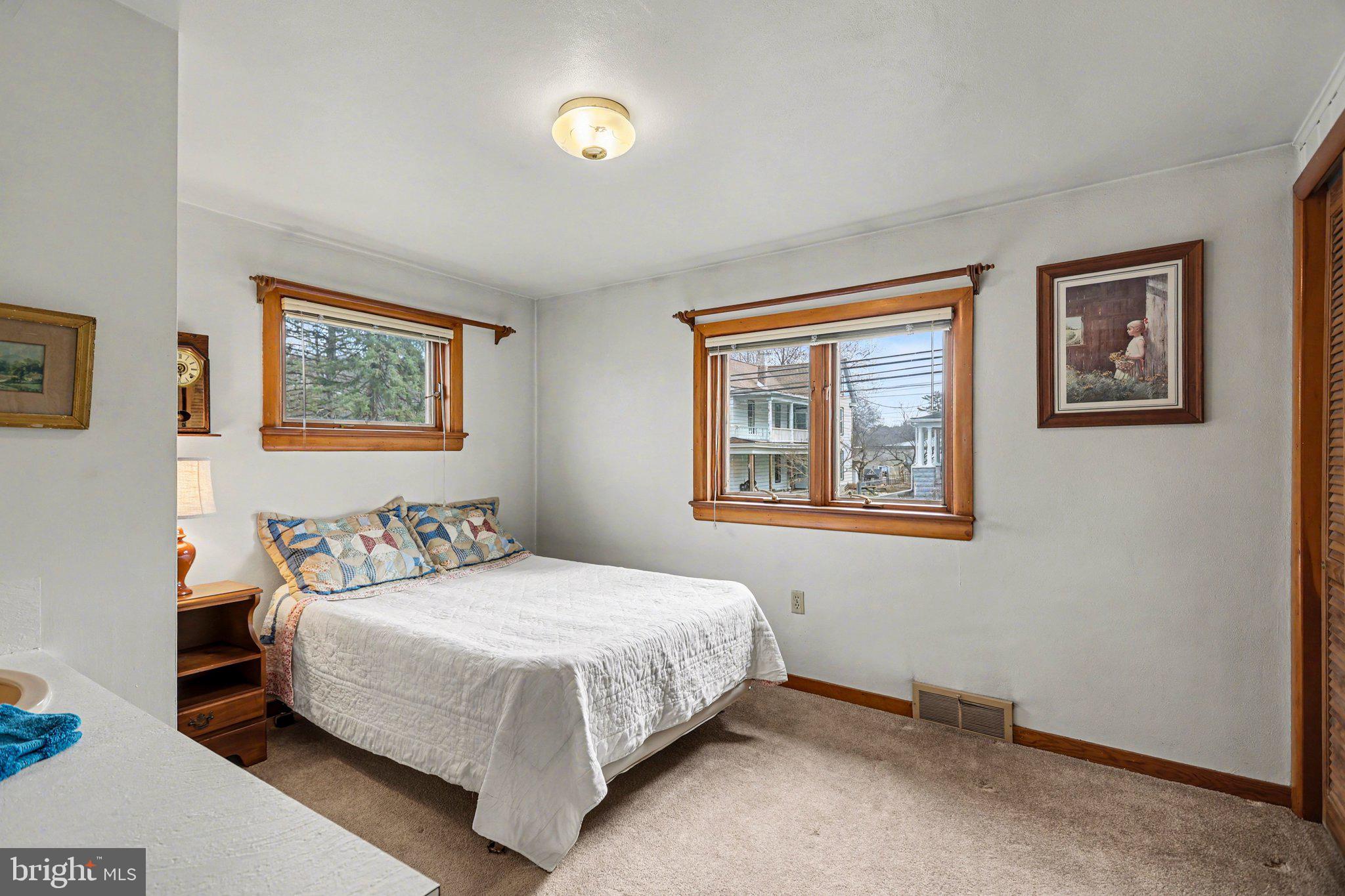 2708 Mill Road Mechanicsburg, PA 17055 - Photo 11 of 27 Cozy bedroom with natural light.