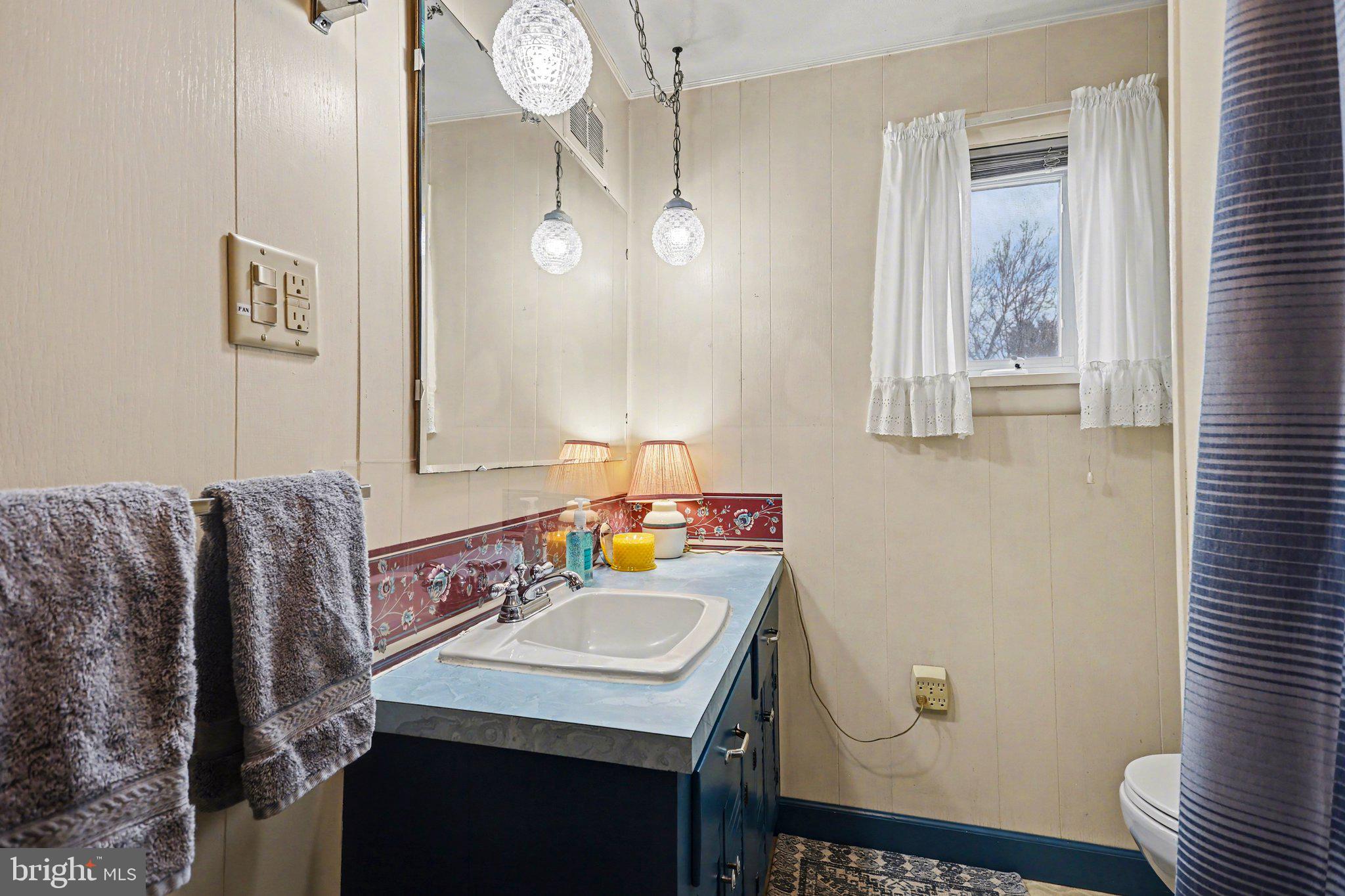 2708 Mill Road Mechanicsburg, PA 17055 - Photo 13 of 27 Charming bathroom with vintage flair.