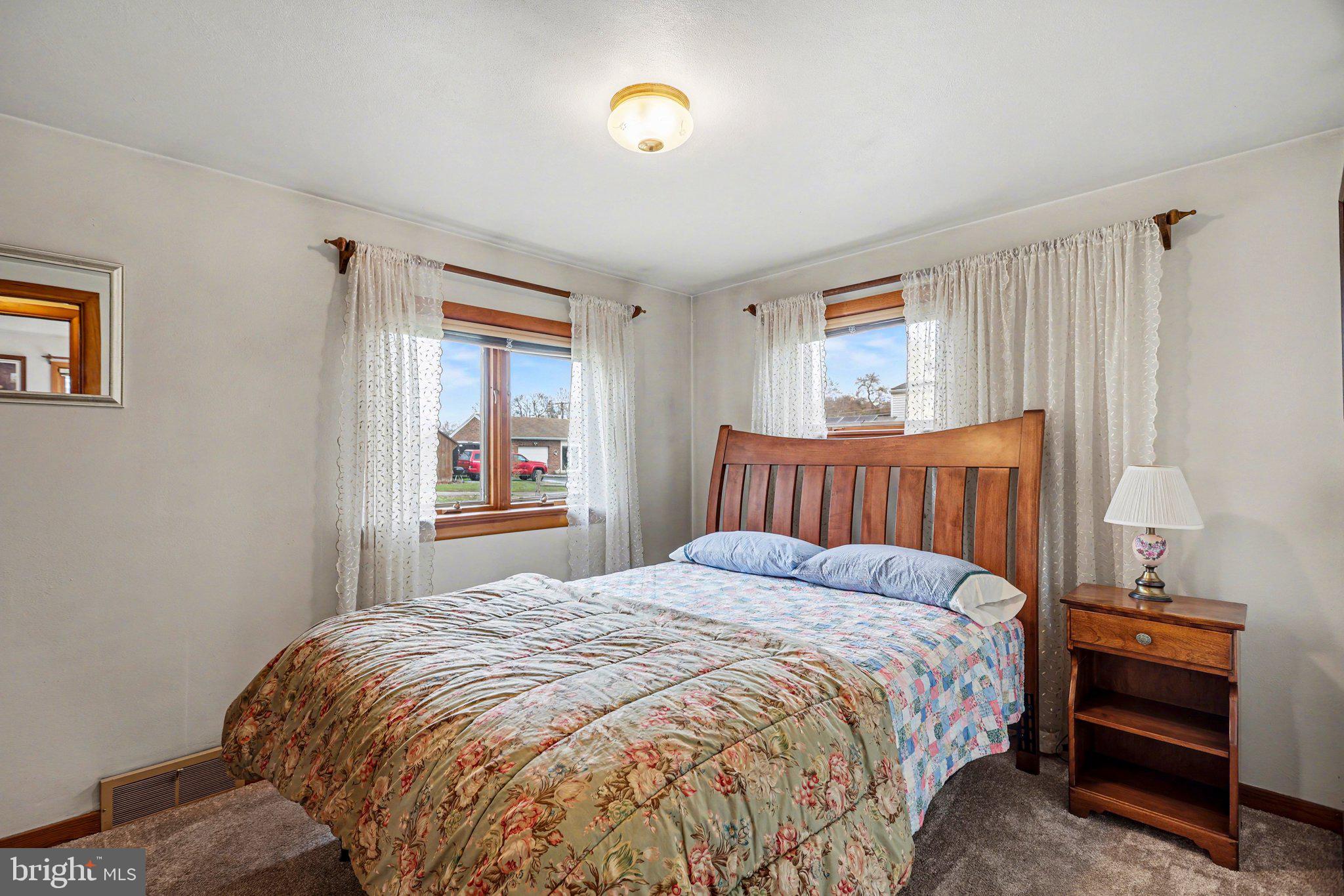 2708 Mill Road Mechanicsburg, PA 17055 - Photo 14 of 27 Cozy bedroom with natural light.