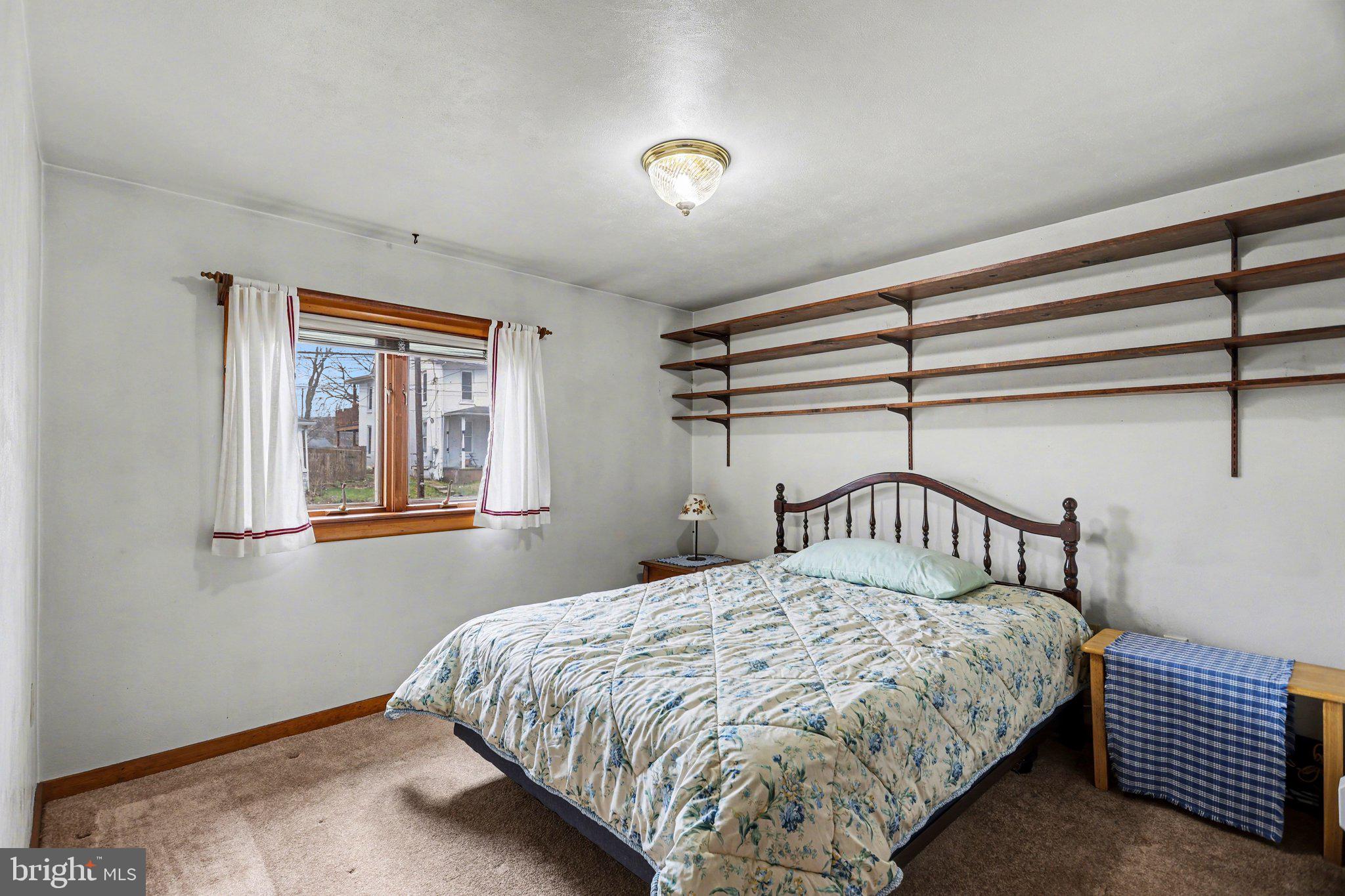 2708 Mill Road Mechanicsburg, PA 17055 - Photo 16 of 27 Cozy bedroom with natural light.