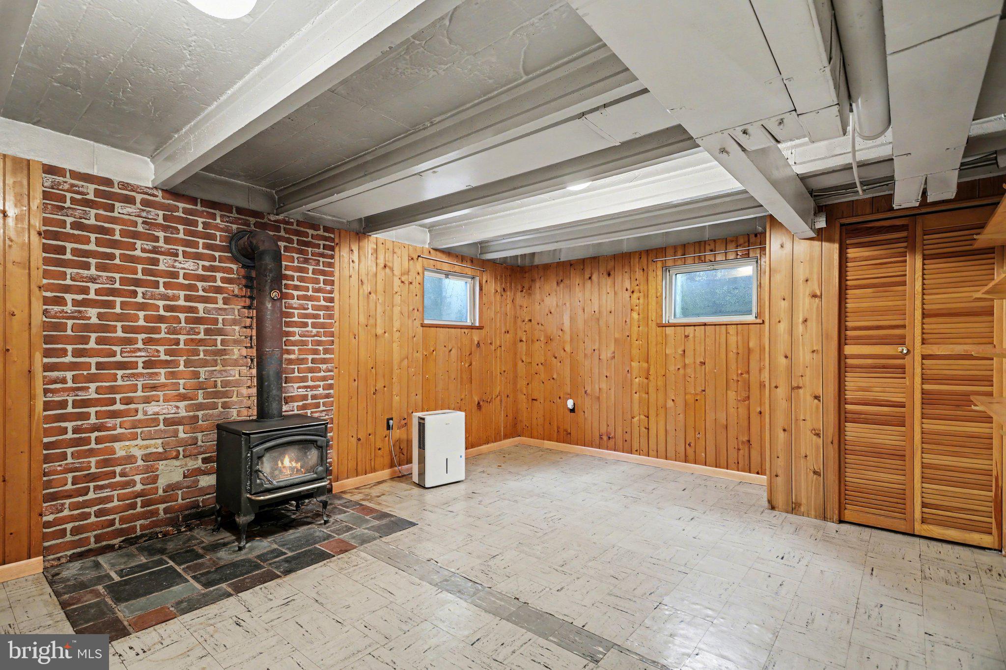 2708 Mill Road Mechanicsburg, PA 17055 - Photo 21 of 27 Cozy basement retreat with rustic charm.