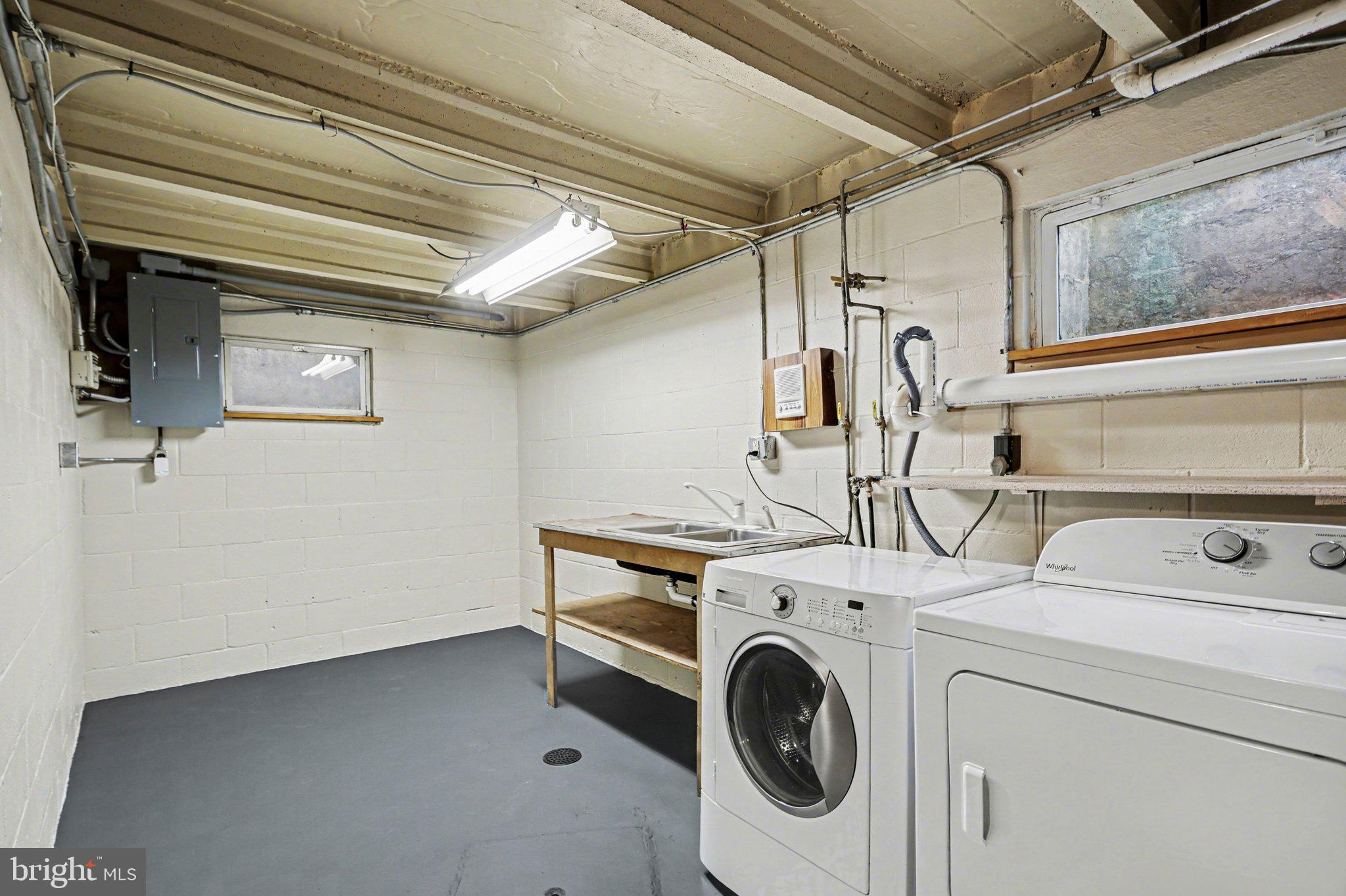 2708 Mill Road Mechanicsburg, PA 17055 - Photo 25 of 27 Bright and functional laundry space.