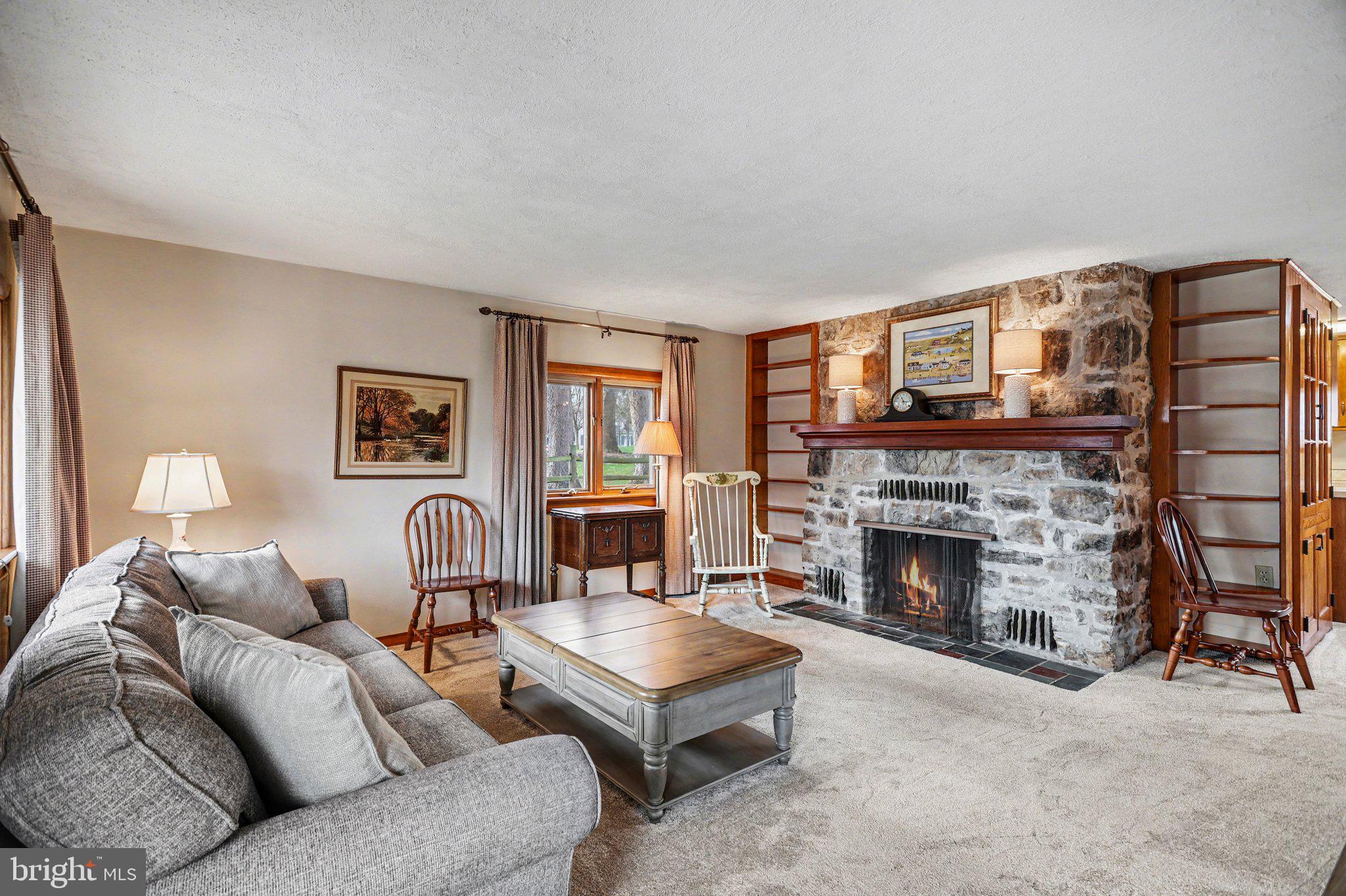 2708 Mill Road Mechanicsburg, PA 17055 - Photo 3 of 27 Cozy living room with stone fireplace.
