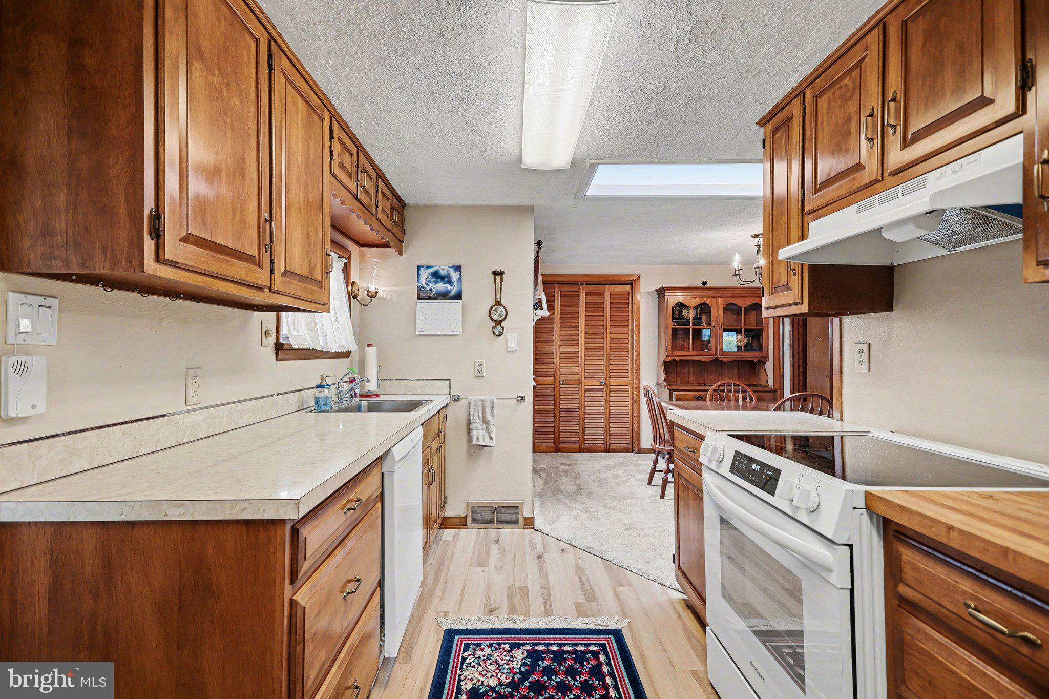 2708 Mill Road Mechanicsburg, PA 17055 - Photo 10 of 27 Warm wooden kitchen with inviting charm.