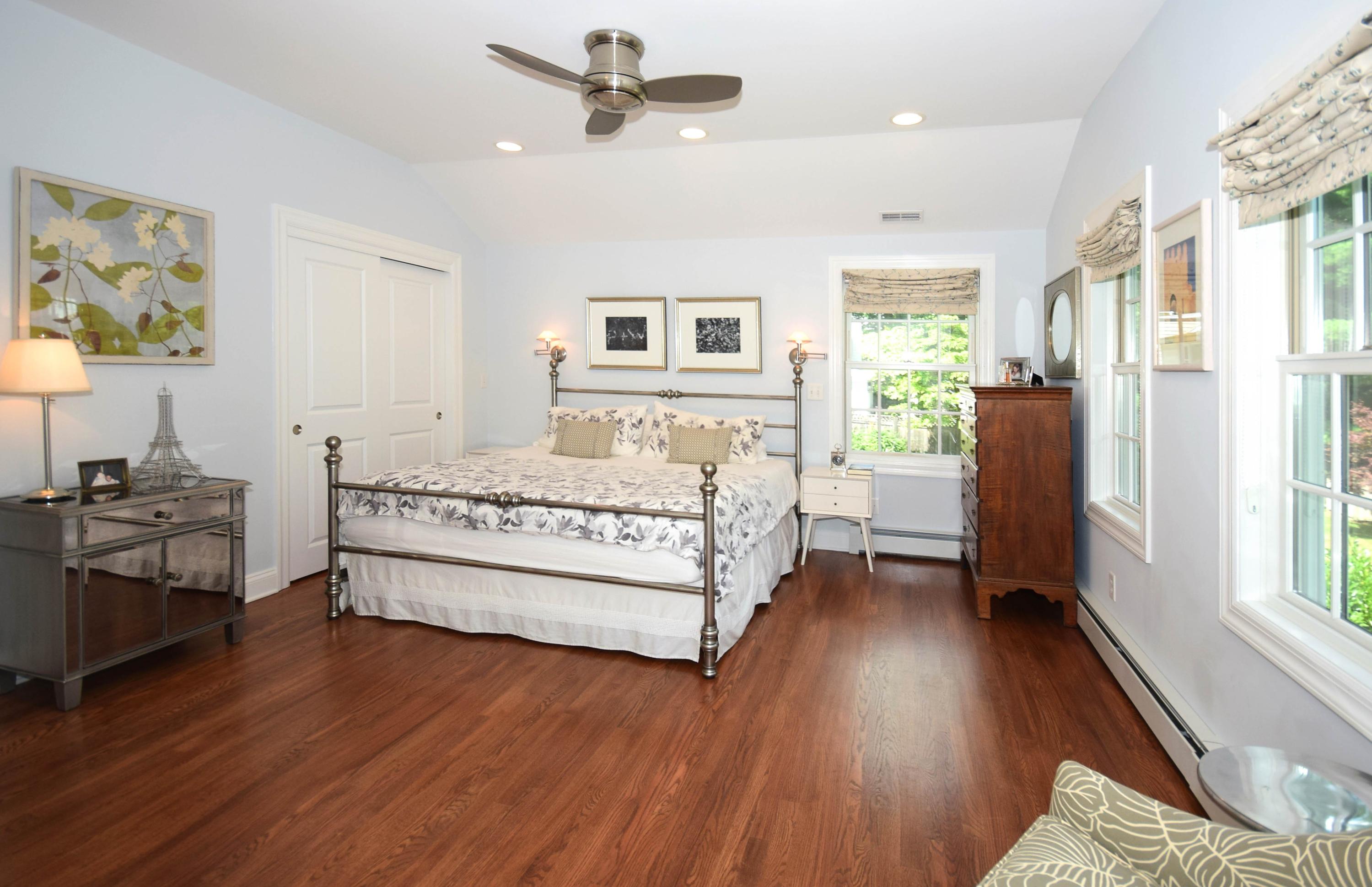 35 Ridgeley Street Darien, CT 06820 - Photo 12 of 25 a bedroom with a bed and a window