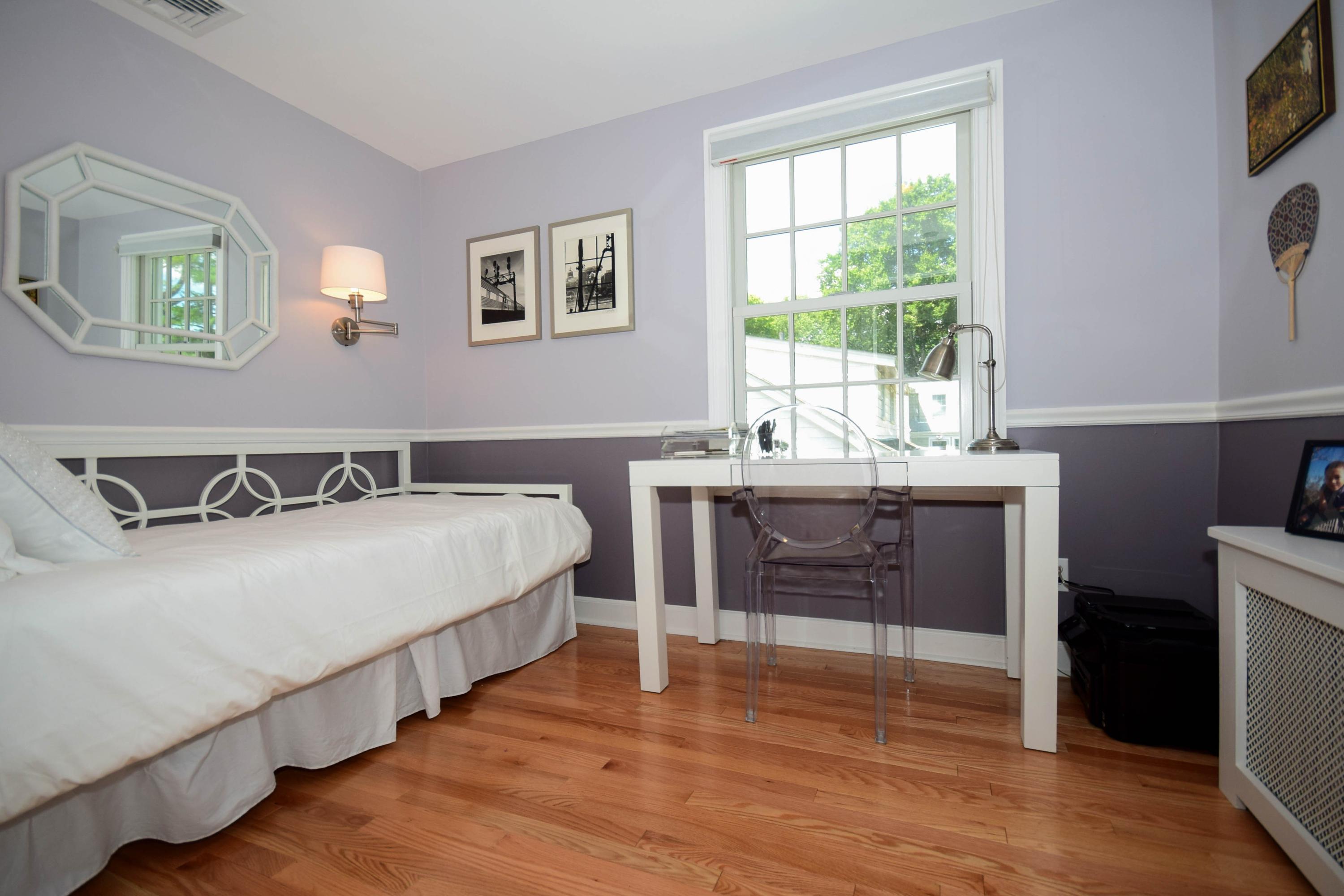 35 Ridgeley Street Darien, CT 06820 - Photo 15 of 25 a bedroom with a bed and a window