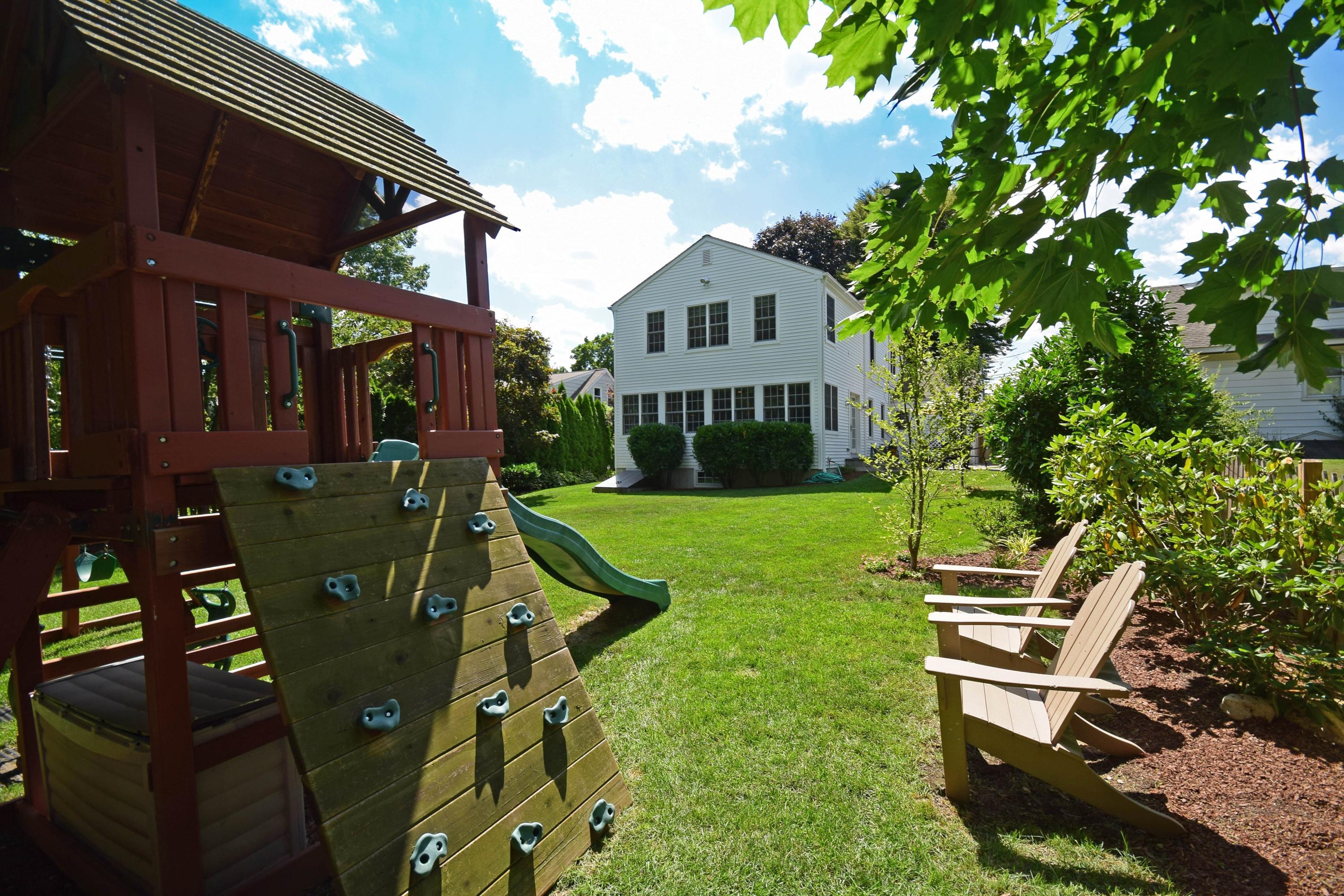35 Ridgeley Street Darien, CT 06820 - Photo 24 of 25 a view of a house with backyard