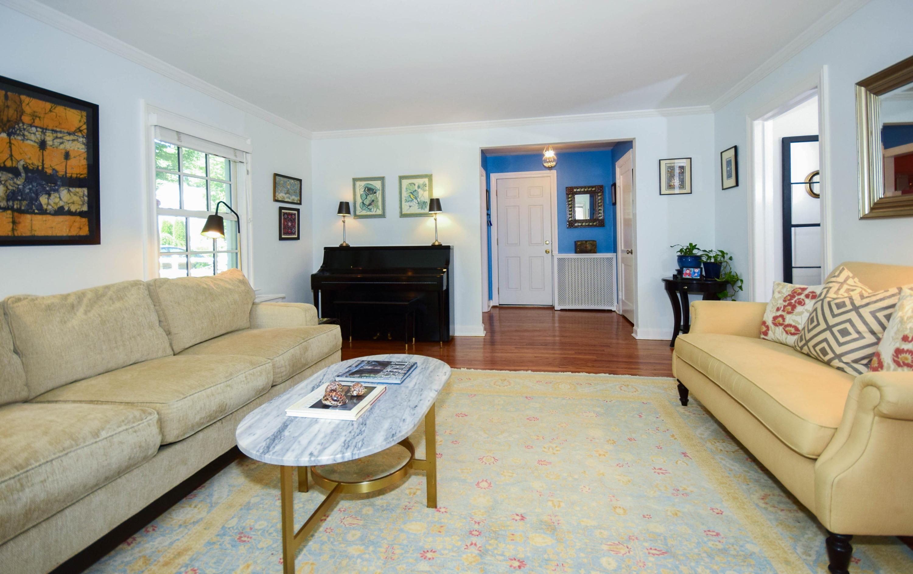 35 Ridgeley Street Darien, CT 06820 - Photo 4 of 25 a living room with furniture and a couch