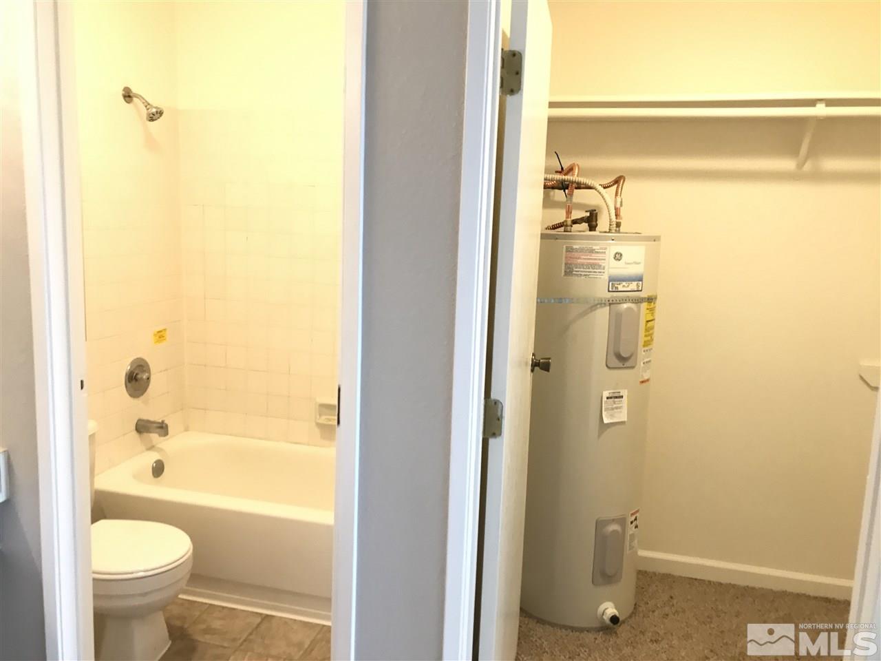 2101 Highview Court, Unit 7 Reno, NV 89512 - Photo 8 of 14 a bathroom with a shower and a toilet