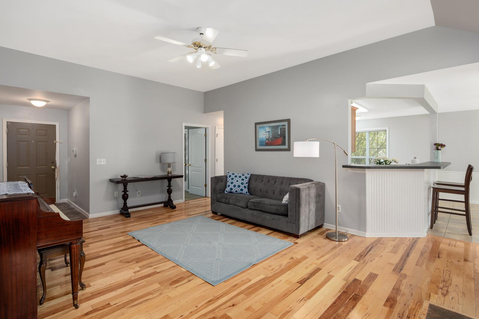 3028 Stone Bridge Road Antioch, TN 37013 - Photo 11 of 30 a living room with furniture and a wooden floor