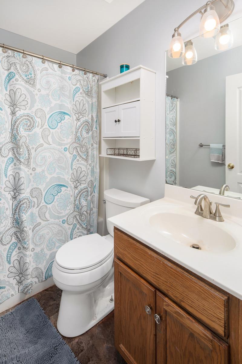 3028 Stone Bridge Road Antioch, TN 37013 - Photo 20 of 30 a bathroom with a sink toilet and shower