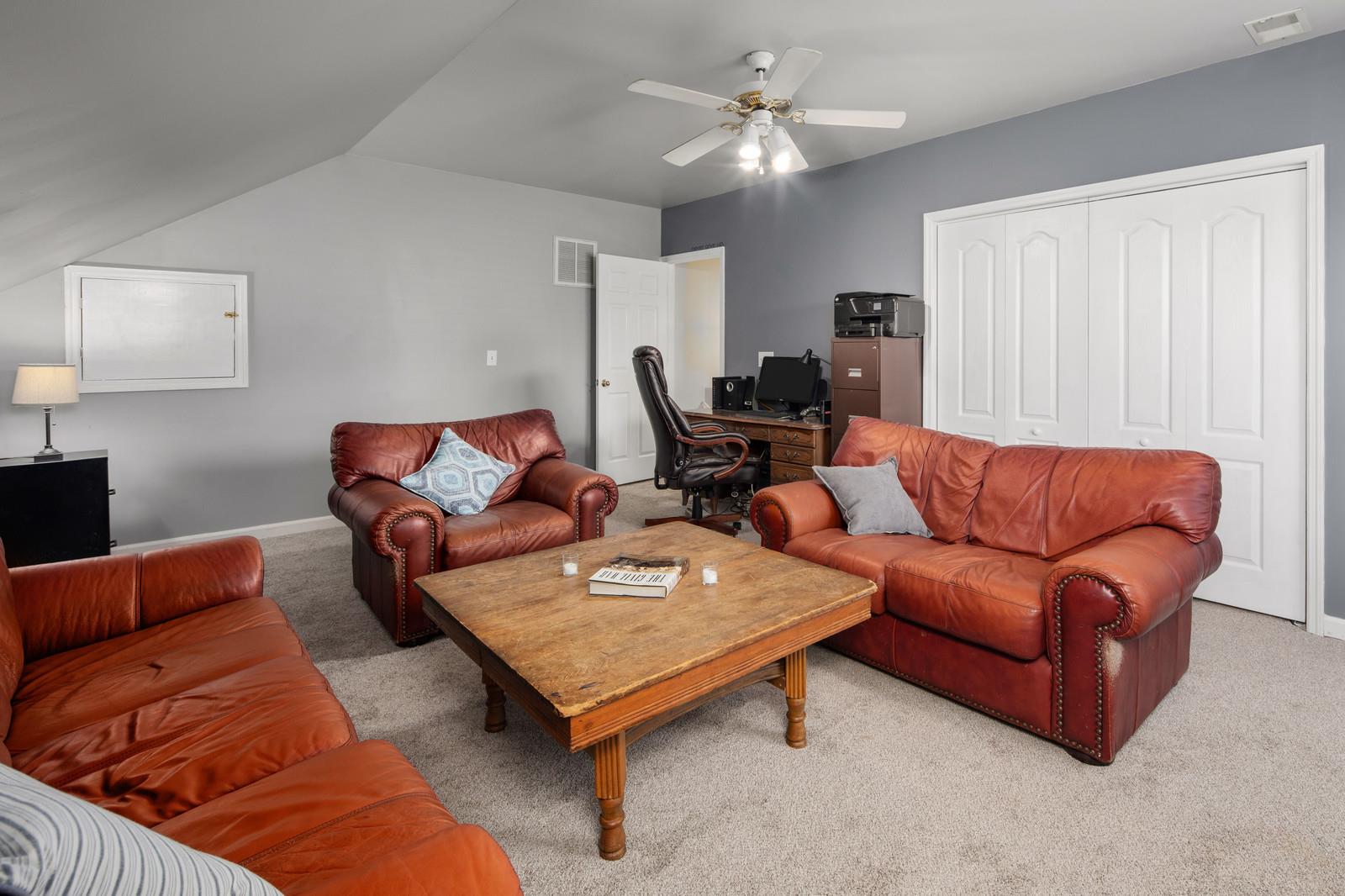 3028 Stone Bridge Road Antioch, TN 37013 - Photo 24 of 30 a living room with furniture a ceiling fan and a rug