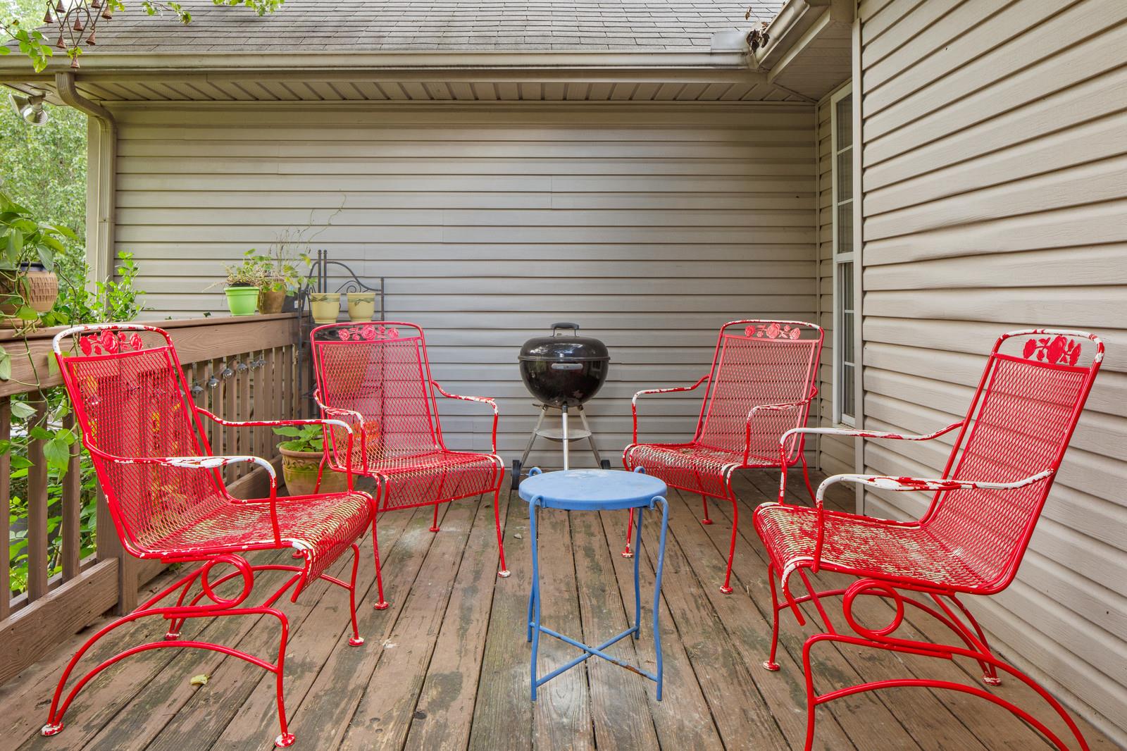 3028 Stone Bridge Road Antioch, TN 37013 - Photo 26 of 30 a view of a balcony with chairs and potted plants
