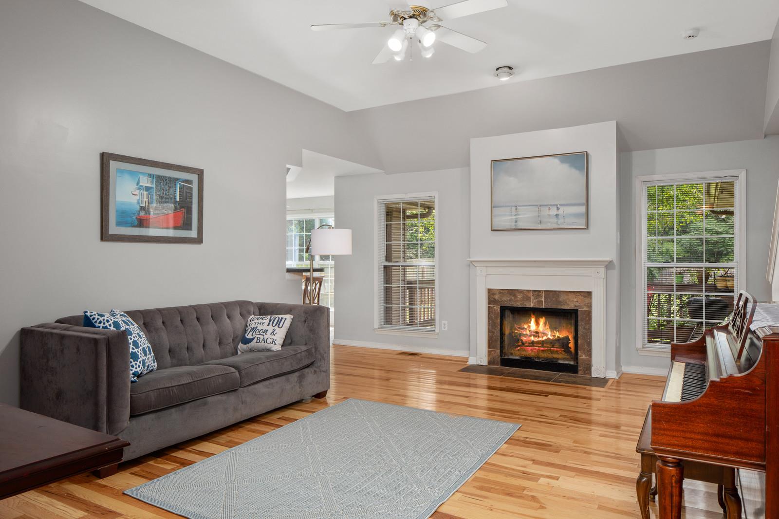 3028 Stone Bridge Road Antioch, TN 37013 - Photo 9 of 30 a living room with furniture and a fireplace