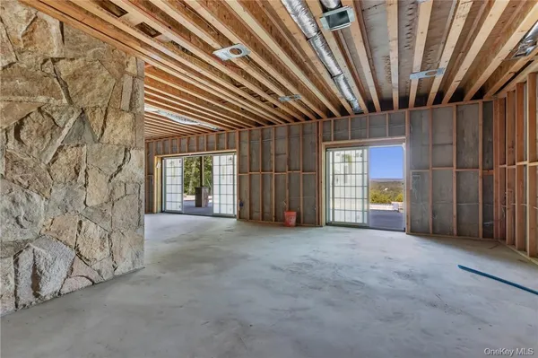 a front view of a house with a glass door