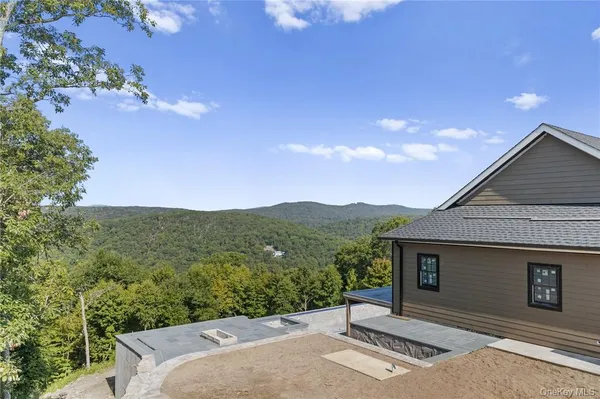 an aerial view of a house with a garden