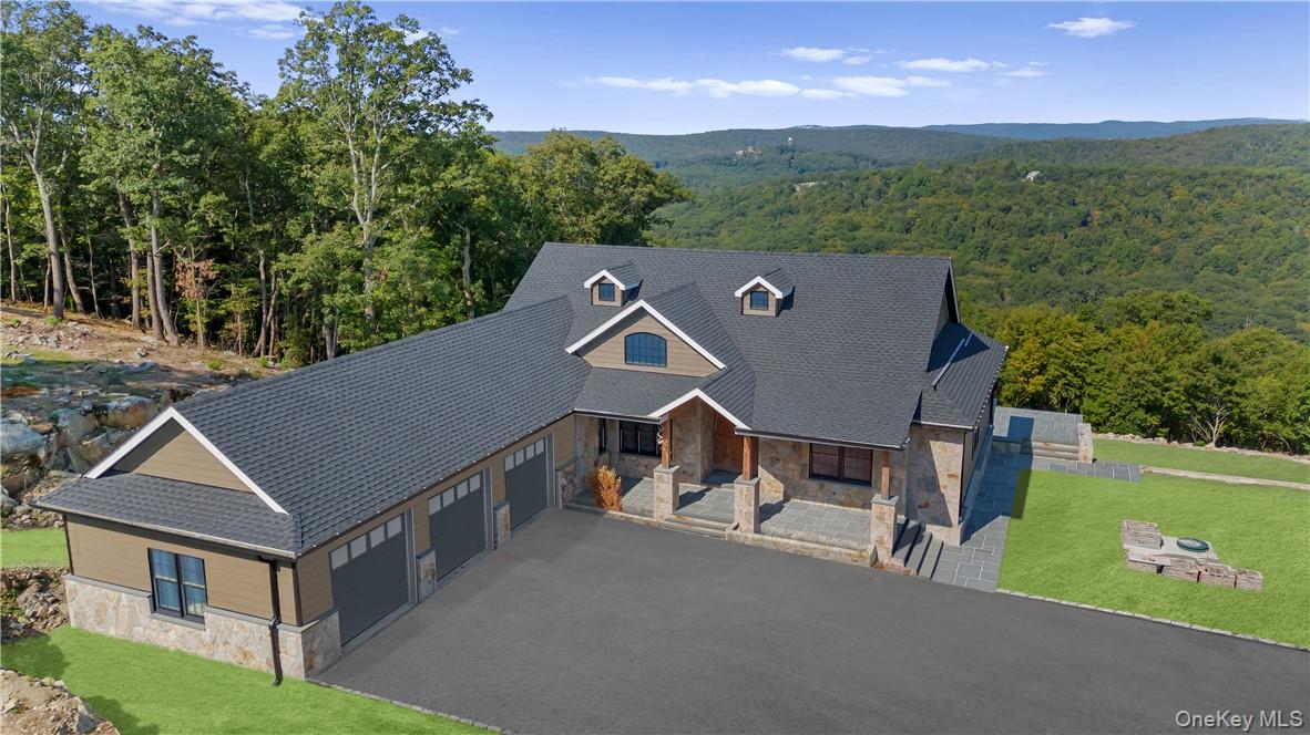 55 Ridgecrest Road Putnam Valley, NY 10537 - Photo 2 of 25 an aerial view of a house