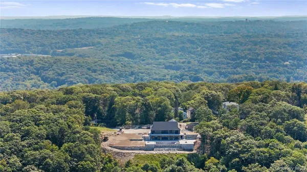 a view of a water with a yard