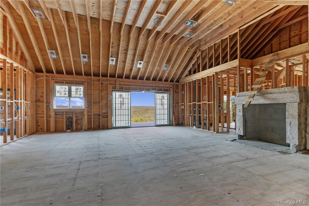 55 Ridgecrest Road Putnam Valley, NY 10537 - Photo 10 of 25 a view of an empty room with windows