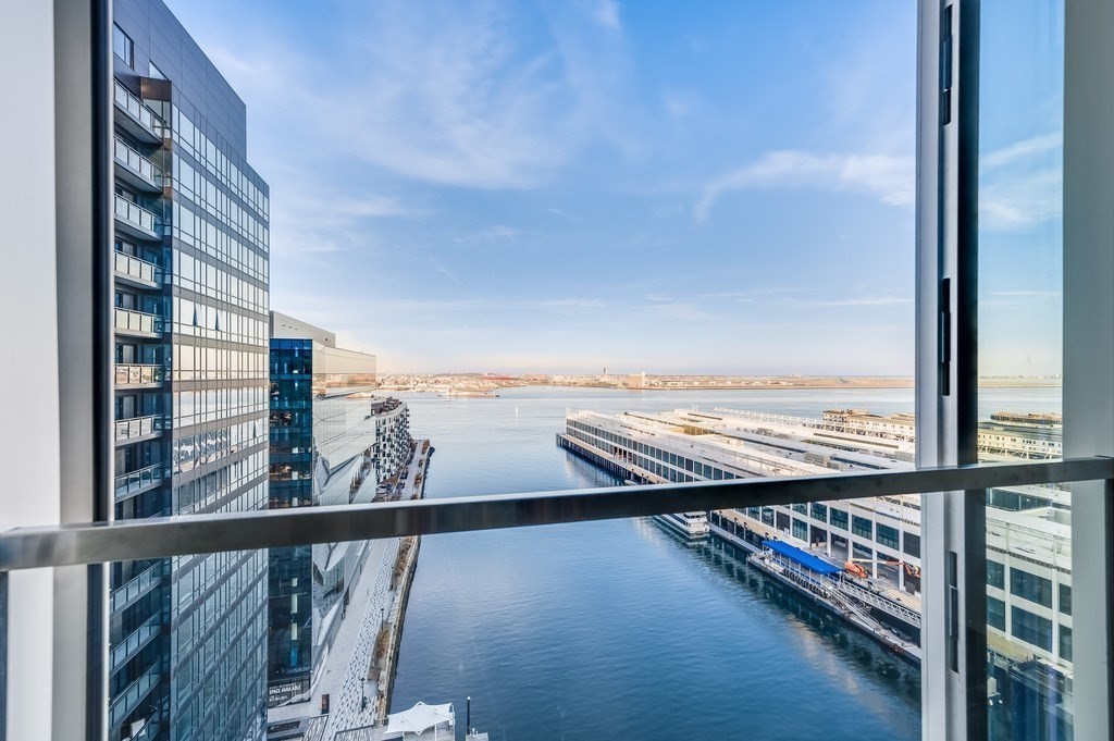 150 Seaport Boulevard, Unit 17D Boston, MA 02210 - Photo 3 of 24 a view of a balcony with an ocean view