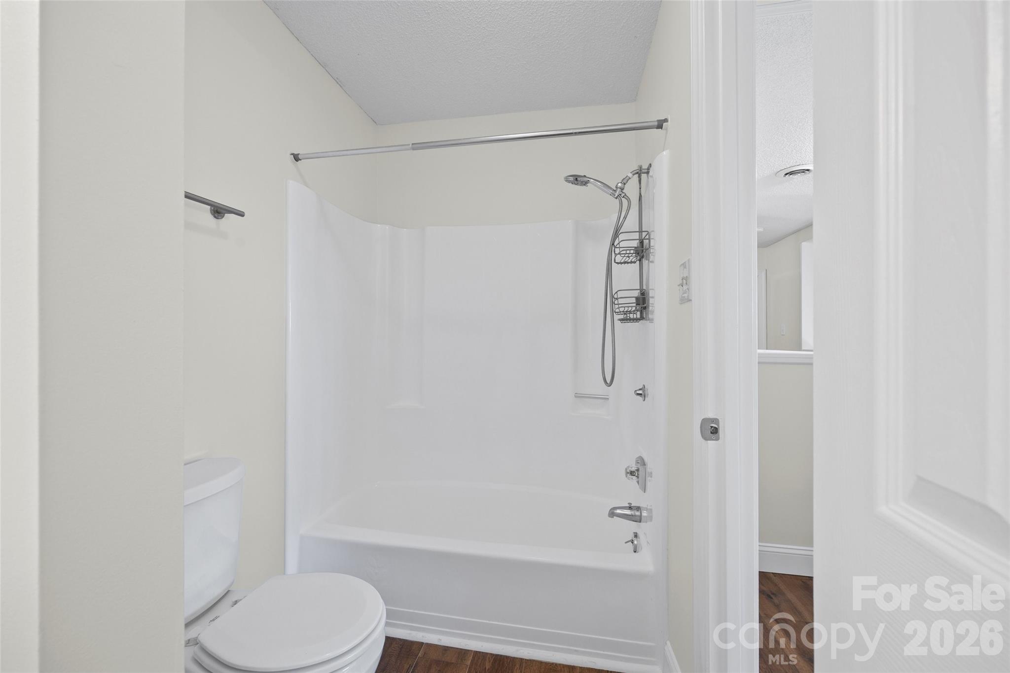 16149 Haroa Court Fort Mill, SC 29708 - Photo 23 of 43 a bathroom with a shower and a toilet