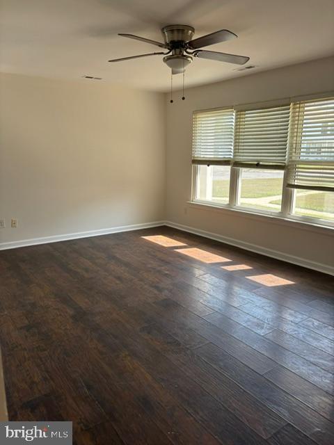 21 Locust Court Sicklerville, NJ 08081 - Photo 11 of 29 an empty room with wooden floor and windows