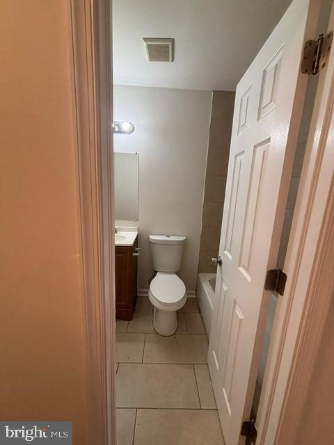 21 Locust Court Sicklerville, NJ 08081 - Photo 12 of 29 a white toilet sitting next to a small bathroom