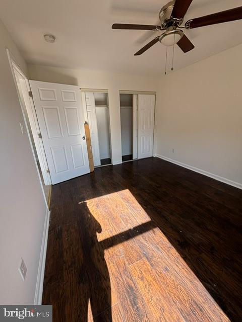 21 Locust Court Sicklerville, NJ 08081 - Photo 23 of 29 a view of an empty room with wooden floor and fan