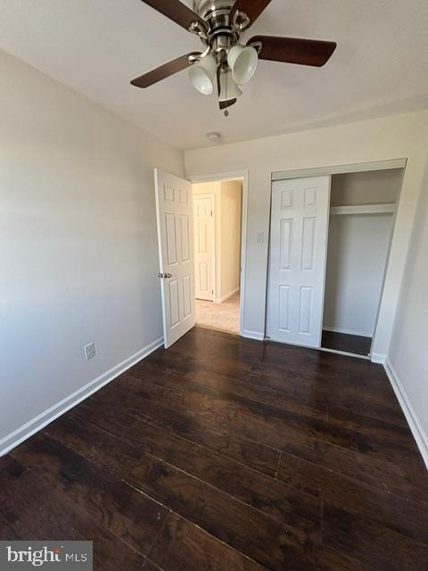 21 Locust Court Sicklerville, NJ 08081 - Photo 27 of 29 a view of an empty room with wooden floor and a ceiling fan