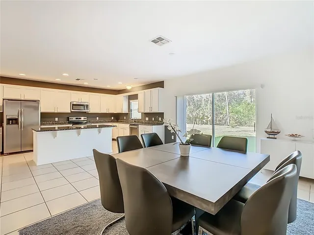 a living room with a couch and a flat screen tv