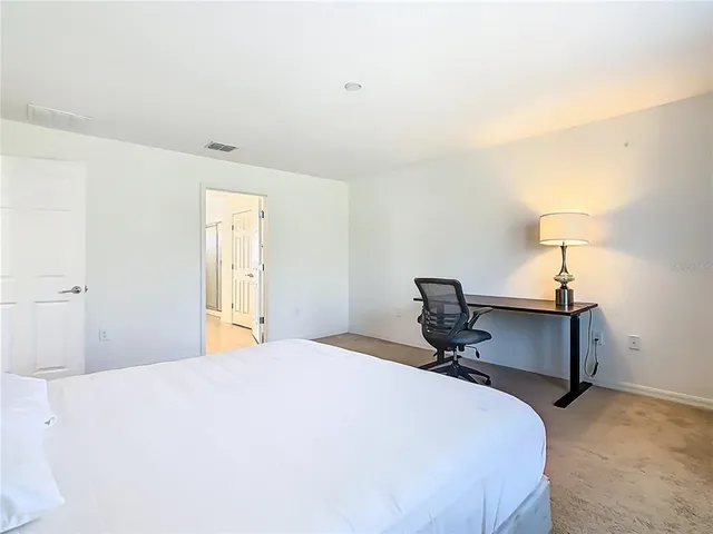 a bathroom with a sink a mirror and a shower