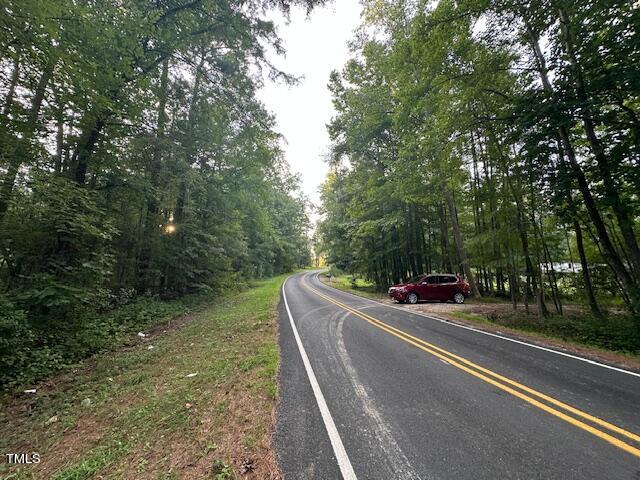 1101 Moss Road Zebulon, NC 27597 - Photo 3 of 22 a view of a street