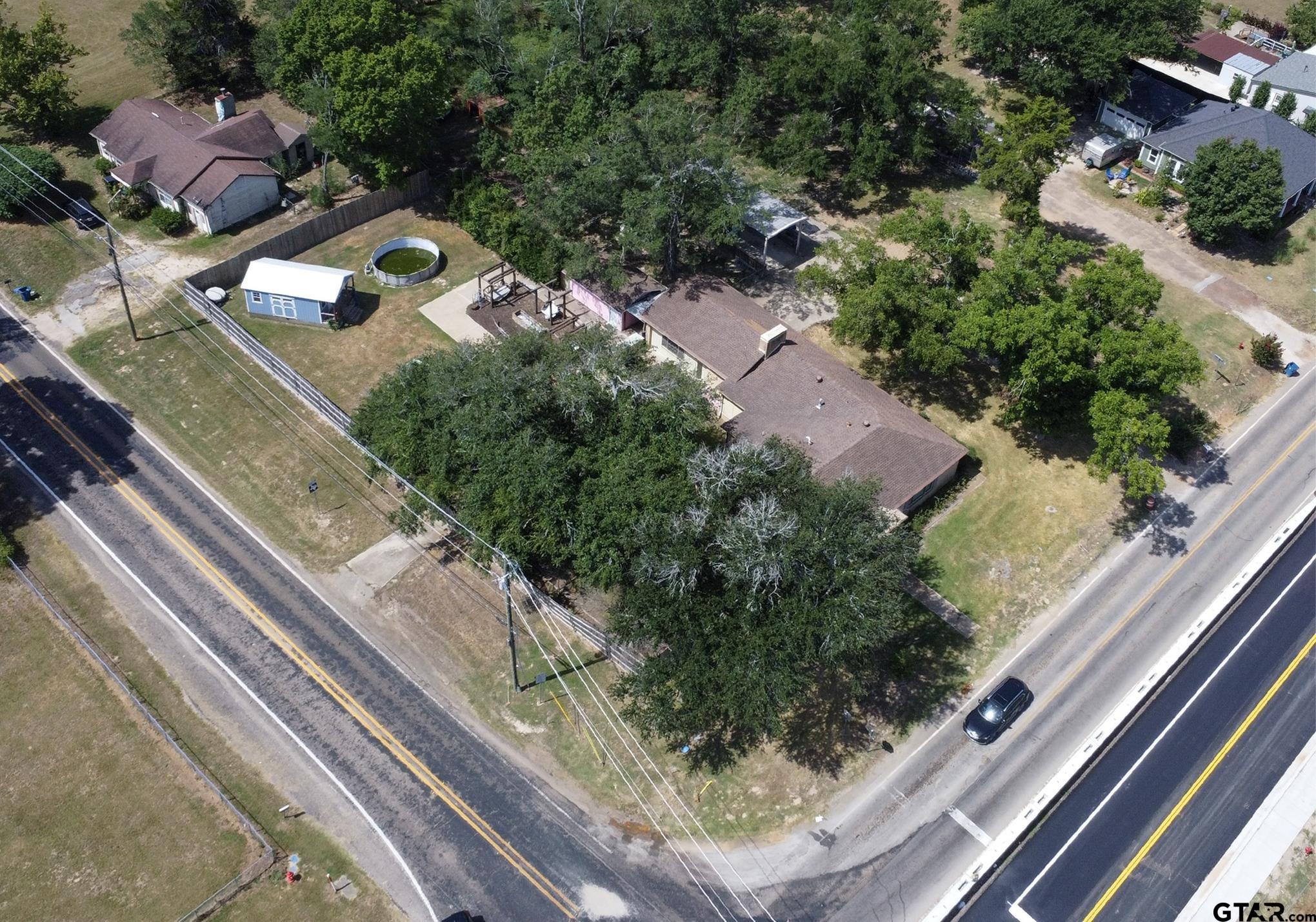 502 West Hubbard Street Lindale, TX 75771 - Photo 35 of 48 a view of a yard from a window