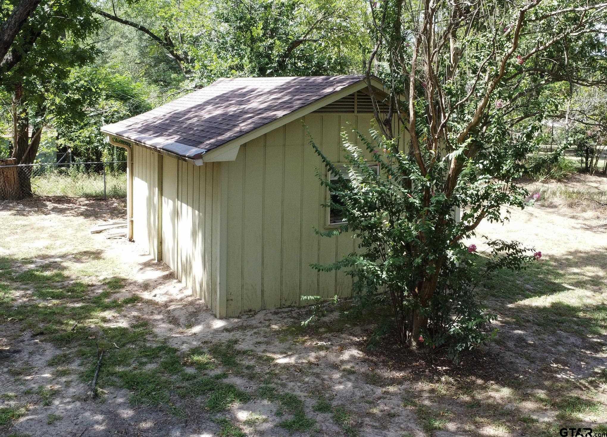 502 West Hubbard Street Lindale, TX 75771 - Photo 38 of 48 a view of a house with a yard