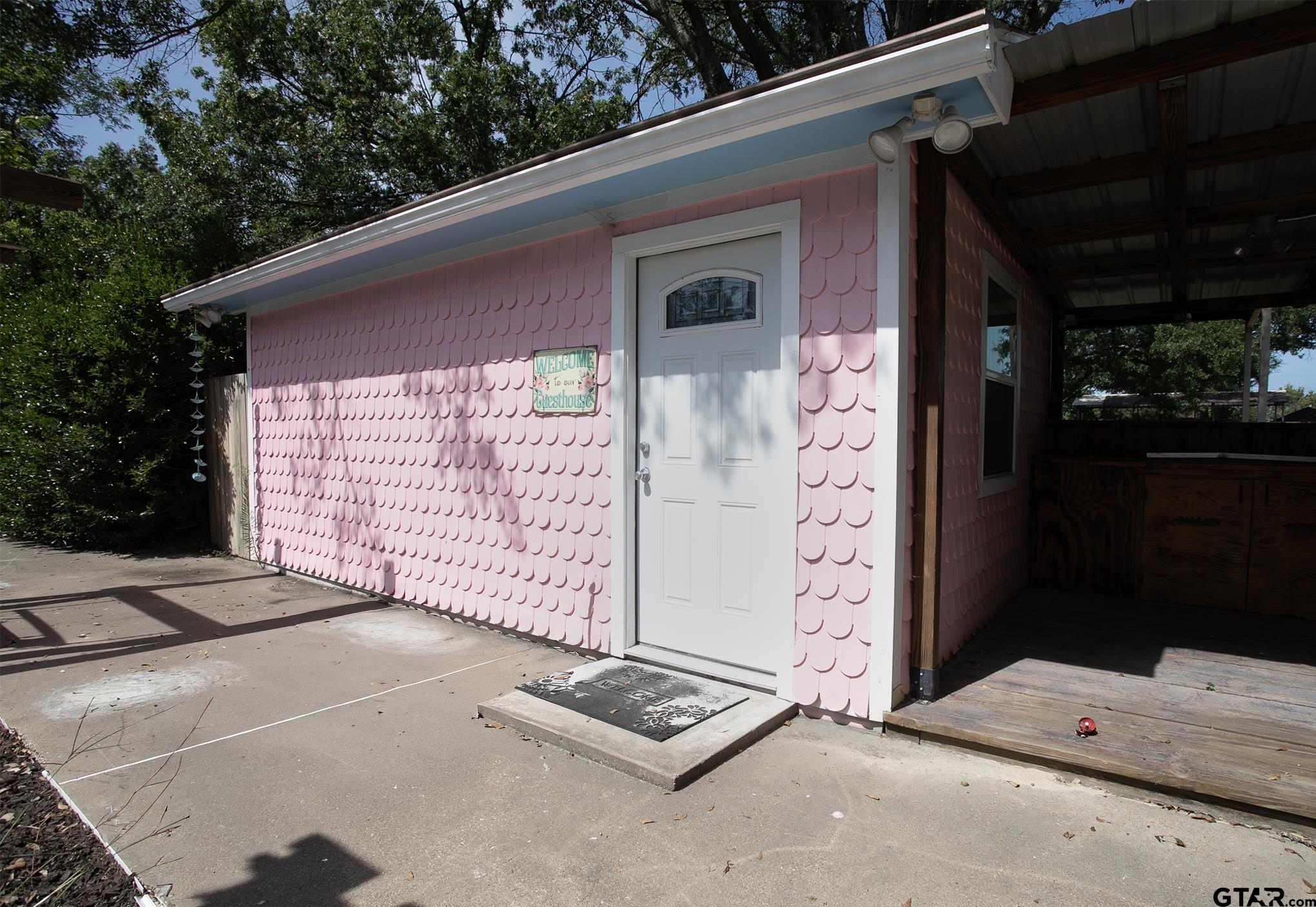 502 West Hubbard Street Lindale, TX 75771 - Photo 46 of 48 a view of entryway with a outdoor space