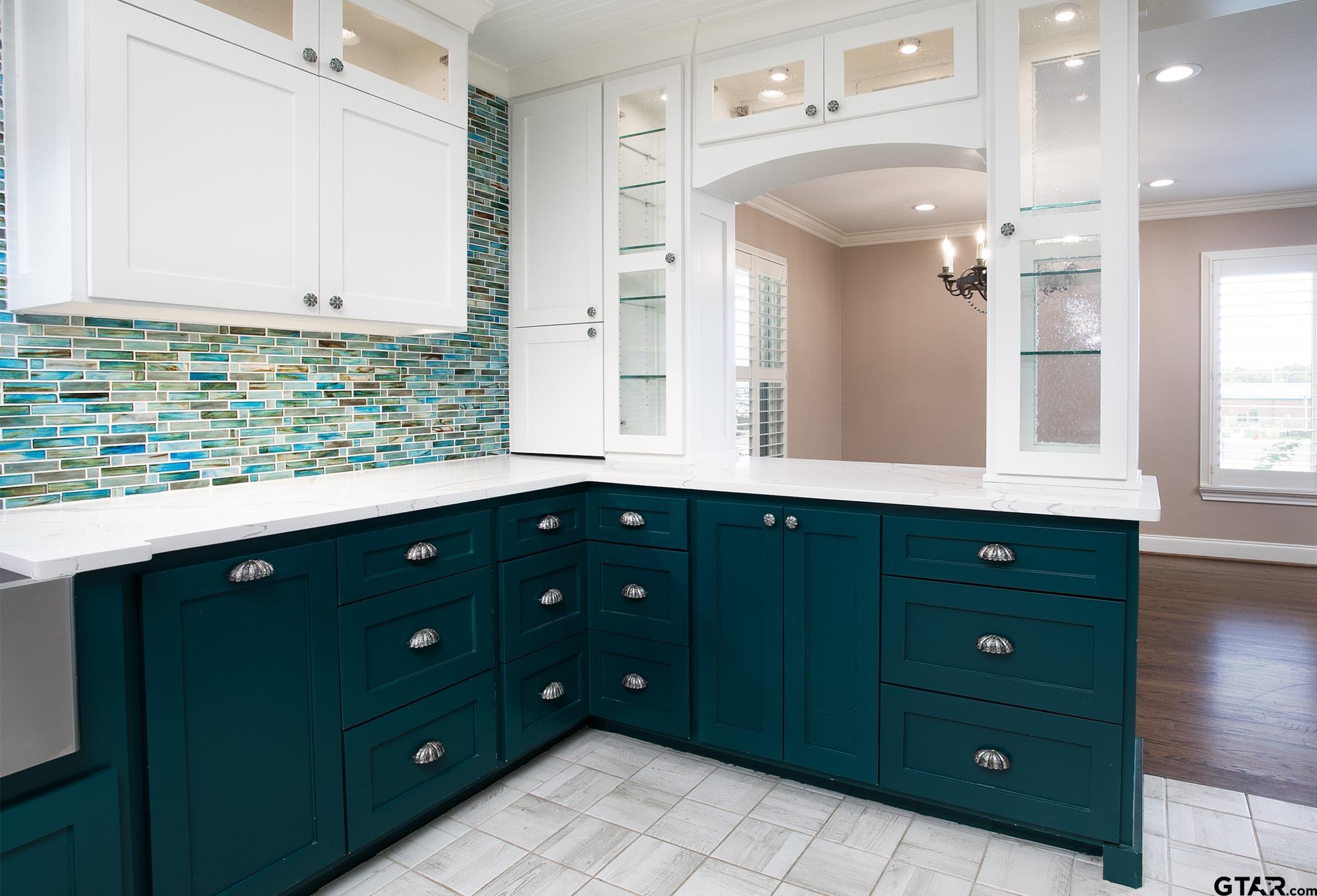502 West Hubbard Street Lindale, TX 75771 - Photo 6 of 48 a bathroom with a double vanity sink and mirror