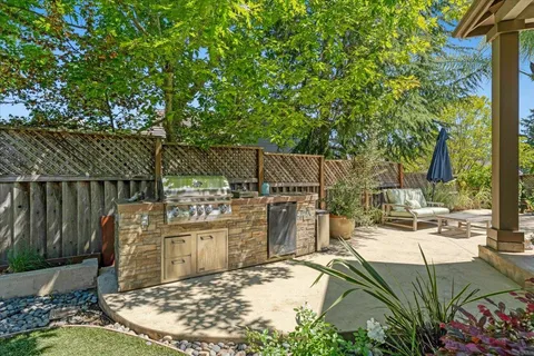 an aerial view of house with yard