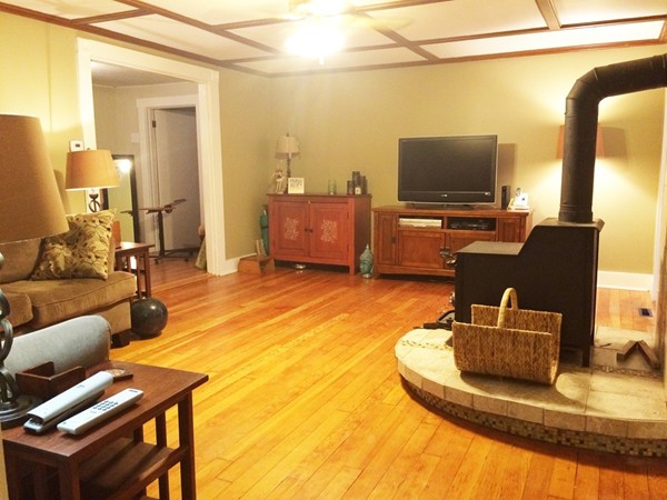 1 Billings Road Merrimac, MA 01860 - Photo 9 of 19 a living room with furniture and a flat screen tv