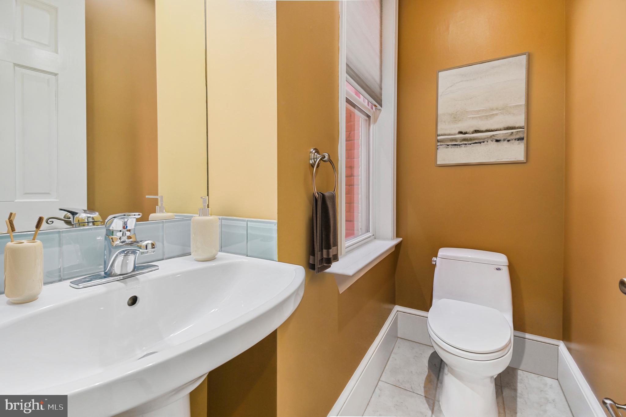 1330 35th Street Northwest Washington, DC 20007 - Photo 11 of 30 a bathroom with a sink and a toilet