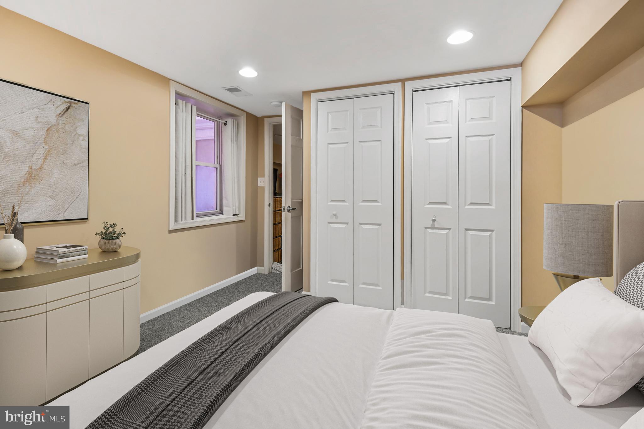 1330 35th Street Northwest Washington, DC 20007 - Photo 27 of 30 a bedroom with a bed and a bathroom