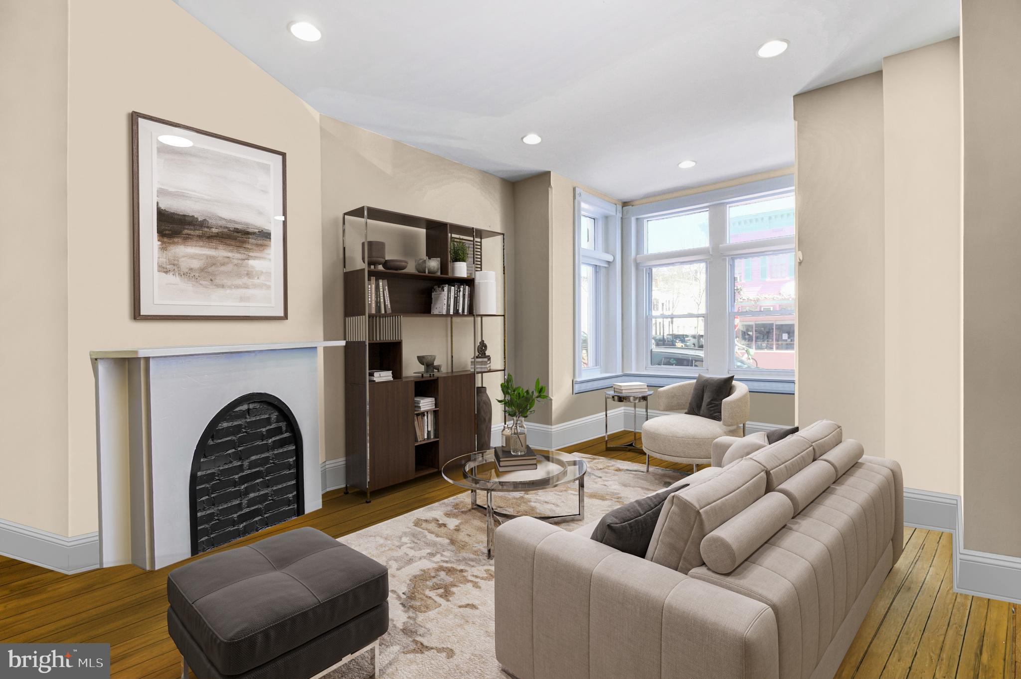 1330 35th Street Northwest Washington, DC 20007 - Photo 4 of 30 a living room with furniture and a large window